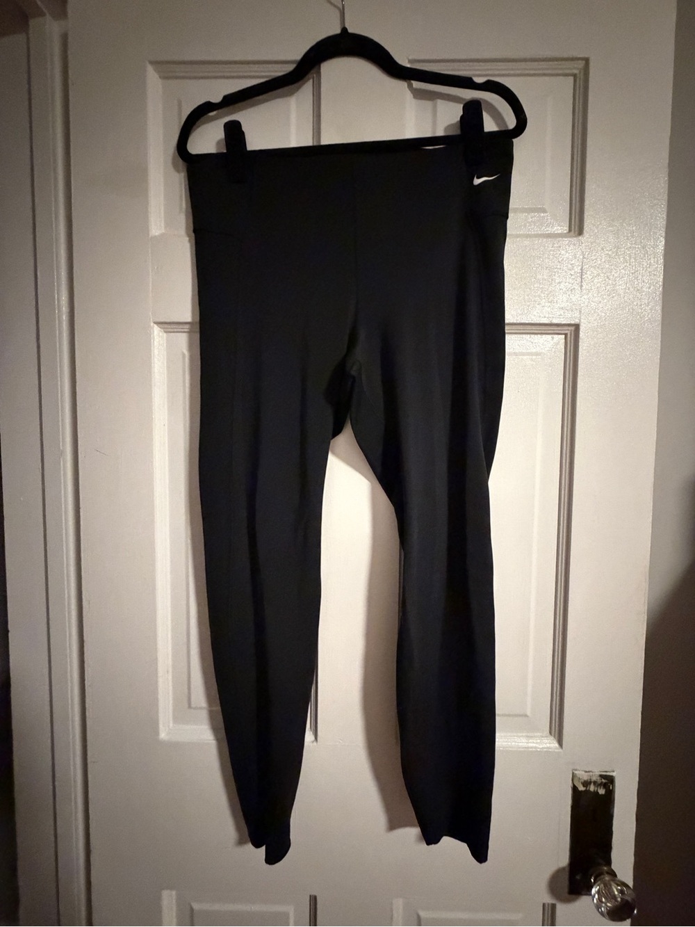 Nike Black High-Rise Performance Leggings with White Swoosh